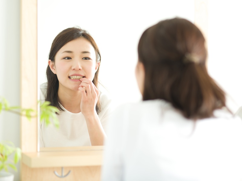 歯茎が黒くなる原因
